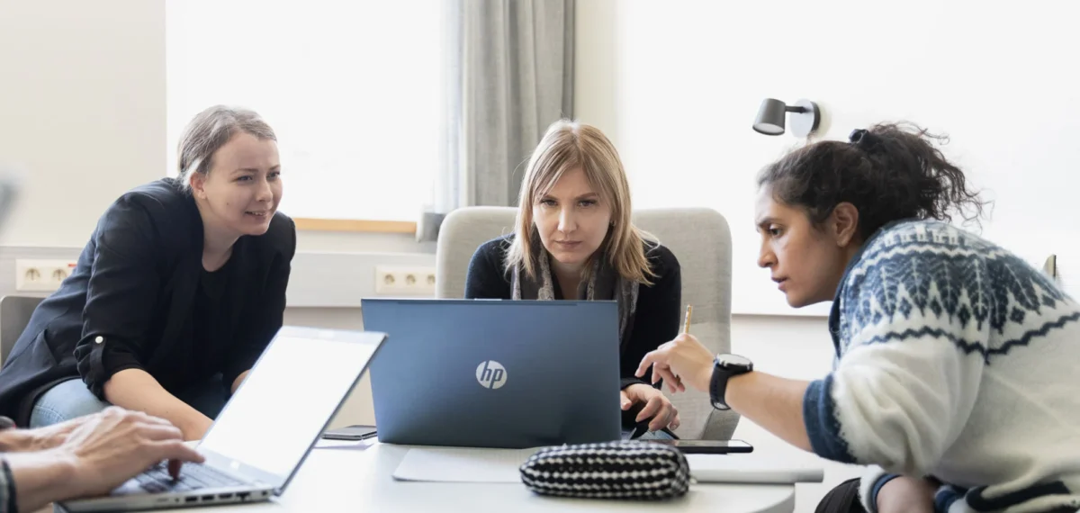 master students working with a group assignment